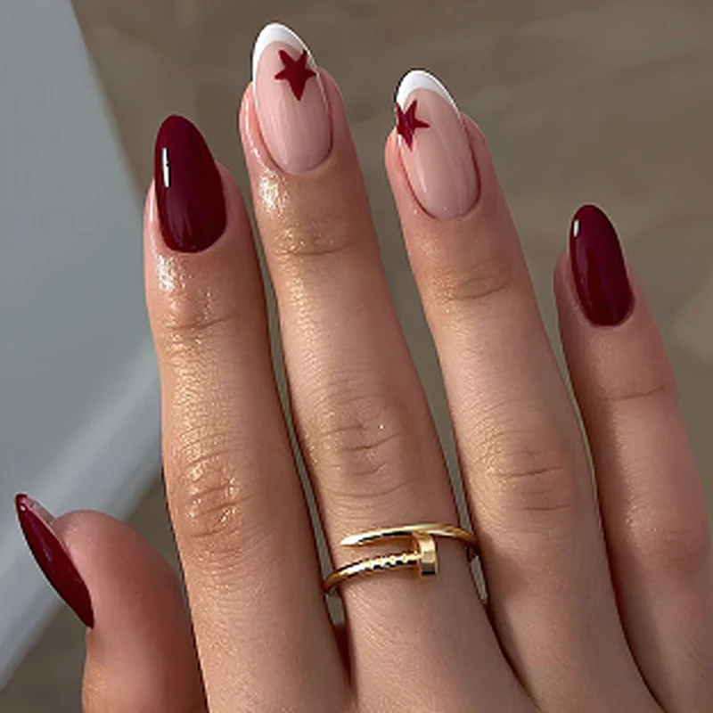 Kunstvolle Nagelverlängerungen mit Stern-Design Karnz