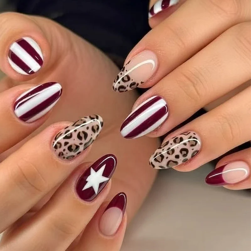 Kunstvolle Stiletto-Nägel mit Leopardenmuster und eleganter Glitzerverzierung Karnz
