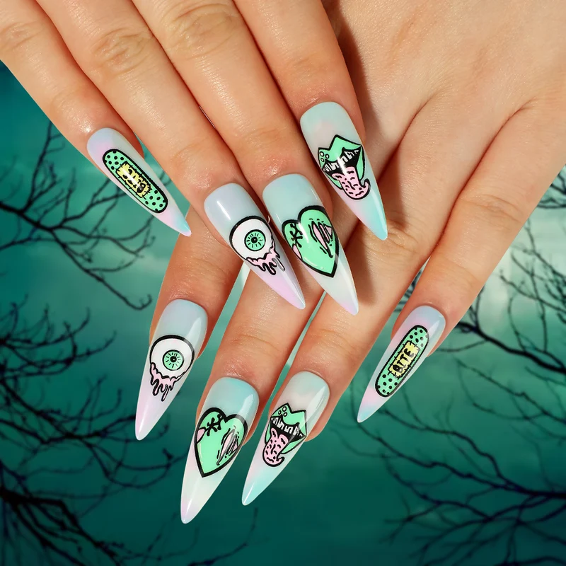 Kunstvolle Stiletto-Nägel mit kreativen Motiven und detailgetreuer Gestaltung Karnz